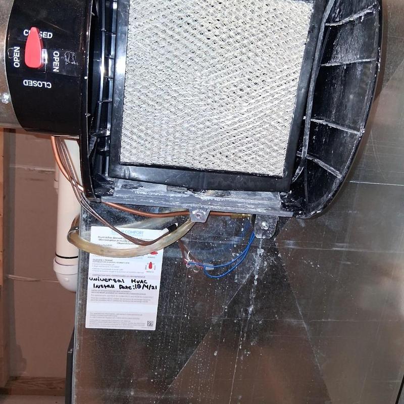 Humidifier pad replacement in HVAC system unit