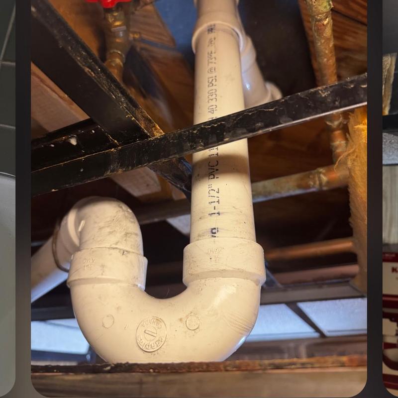 PVC P-trap and drain line installation under sink