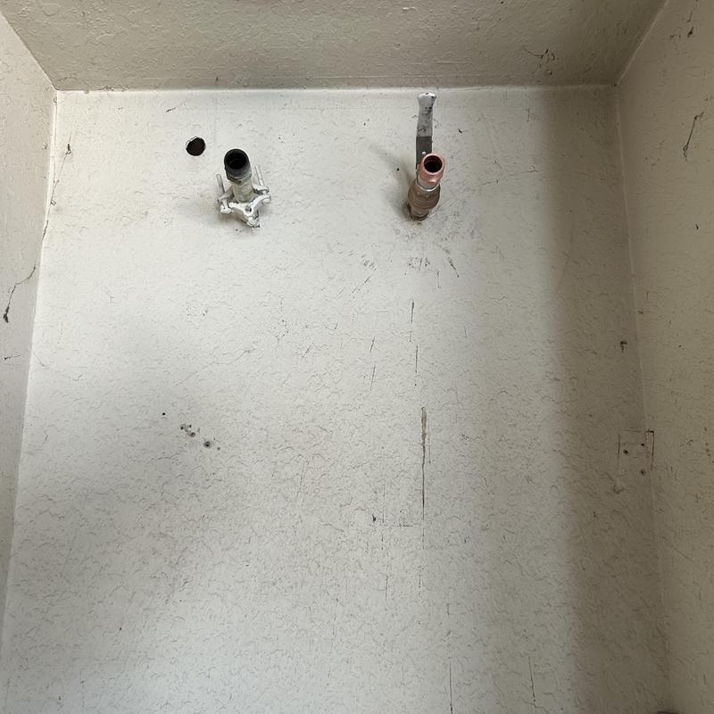 Water heater supply pipes with shut off valves removed