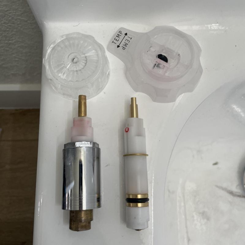Mixer shower valve cartridge and control knobs on sink