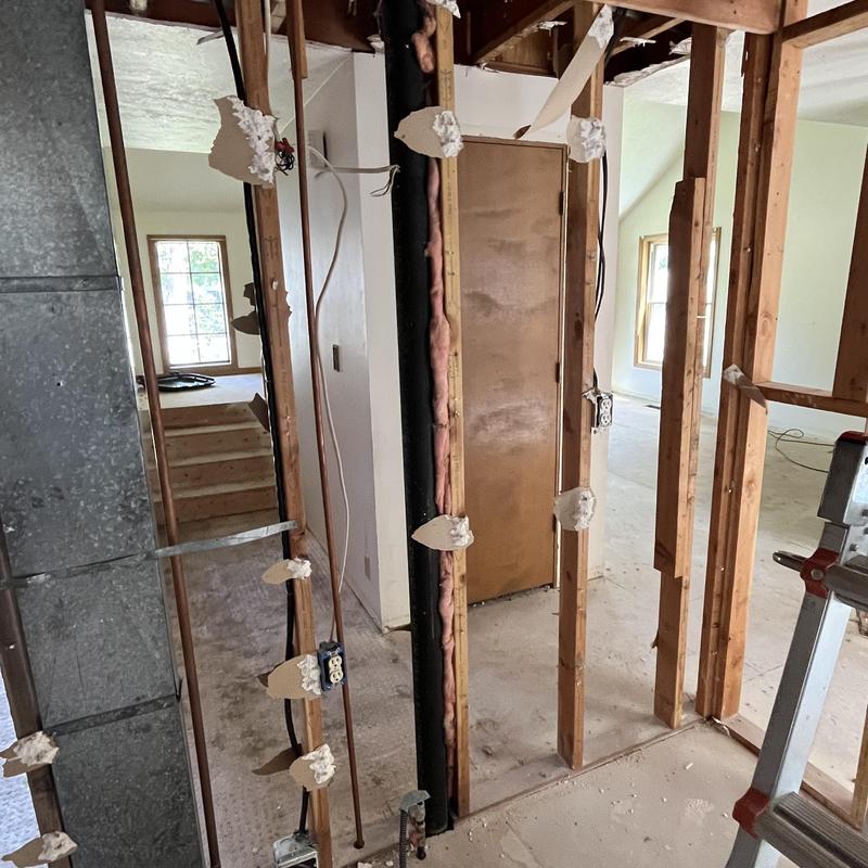 Home drainage stack pipe during remodel framing removal