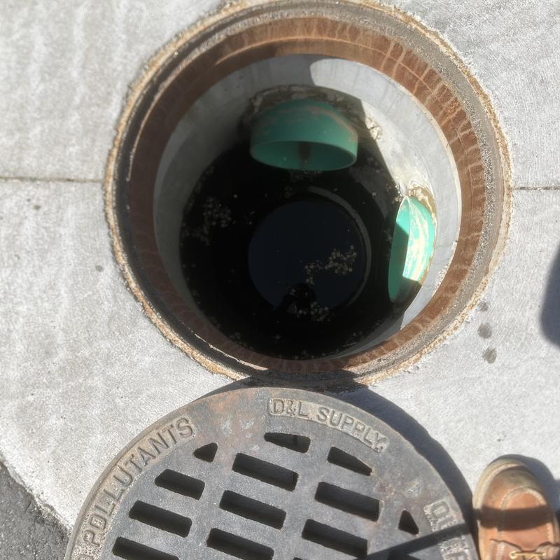 Storm drain basin inspection with minor debris inside