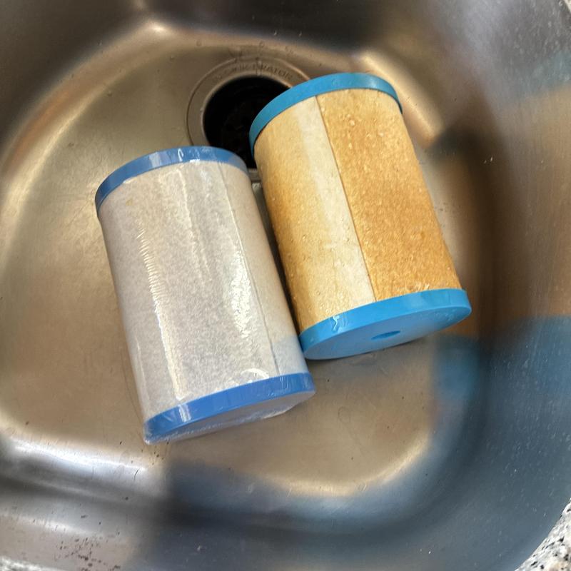 Water filtration cartridge replacement in kitchen sink