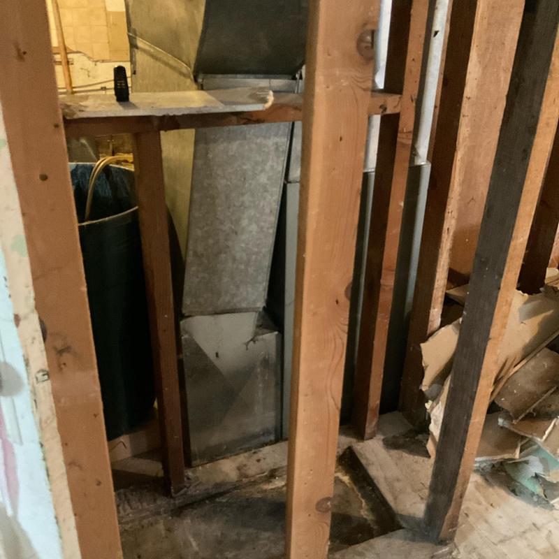 HVAC ductwork inside wall framing during estimate