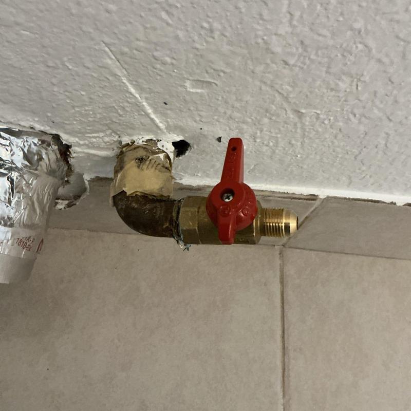 38 gas shut-off valve with red handle on gas line