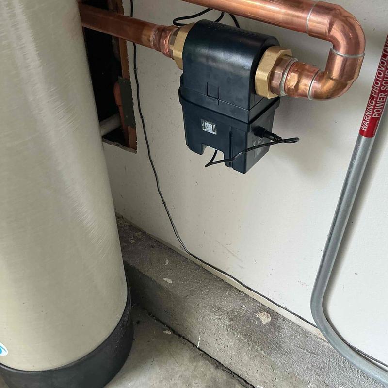Moen Flo water usage monitor installed on plumbing