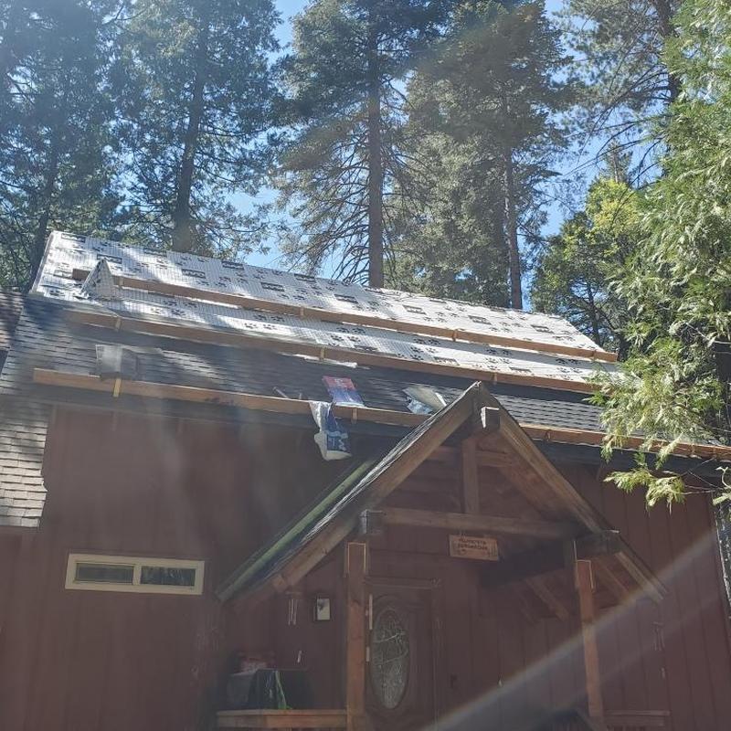 Gaf lifetime asphalt roof installation on cabin roof