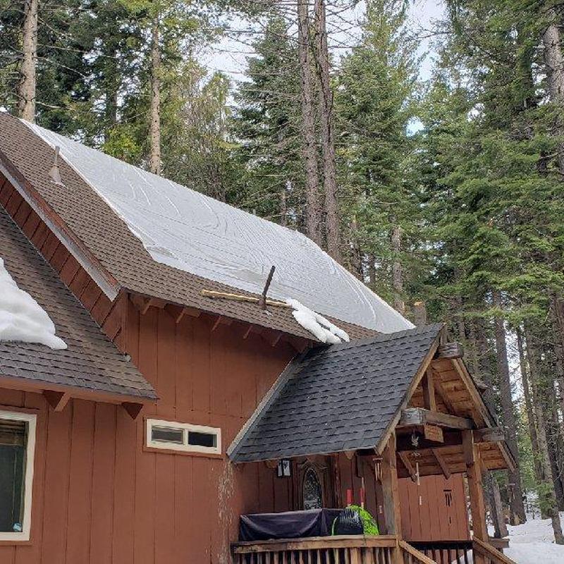 GAF lifetime asphalt roof on cabin in forest