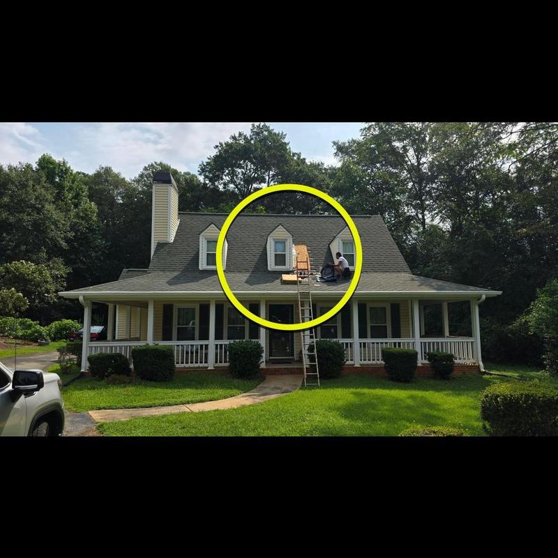 Dormer roof shingles with ladder and worker Dormer roof shingles with ladder and worker