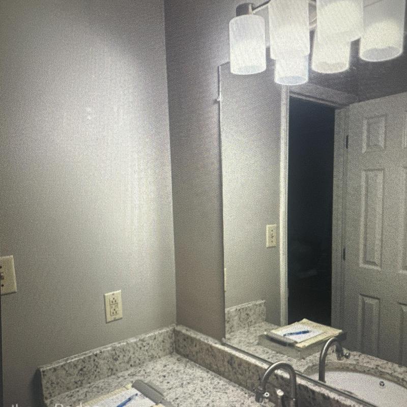 Exhaust fan upgrade with painted walls and tile floor