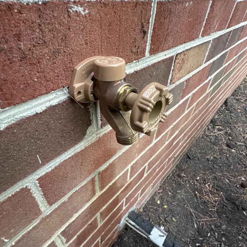 Frost free hose bib replacement on brick wall
