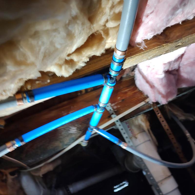 Water line piping with insulation in crawl space