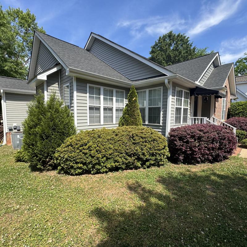 House siding replacement with gray vinyl panels House siding replacement with gray vinyl panels