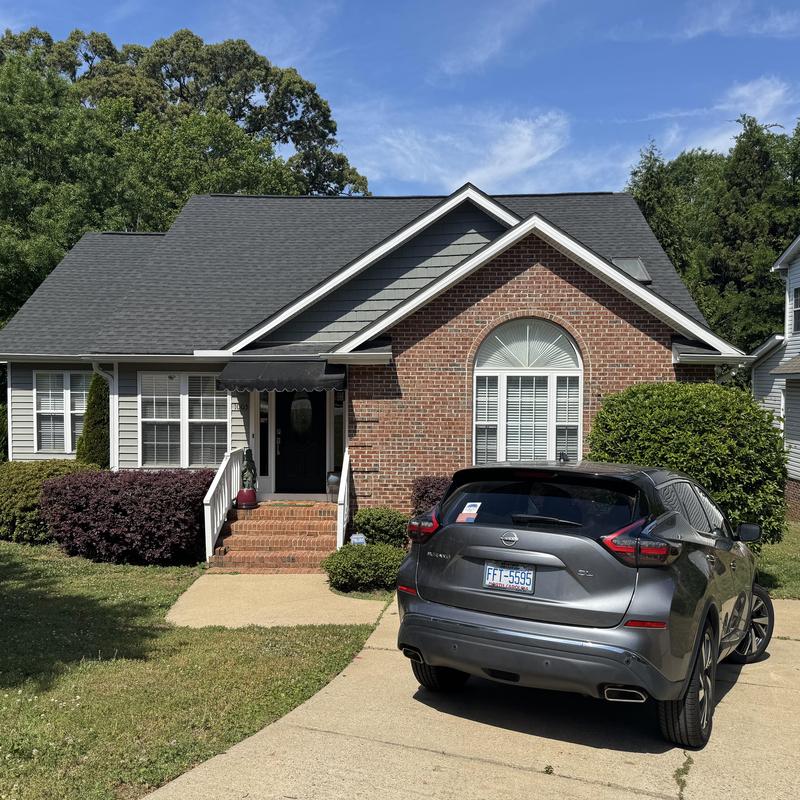 House siding with brick and gray panels, Raleigh NC House siding with brick and gray panels, Raleigh NC