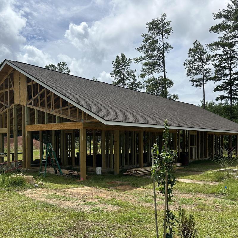 Asphalt shingle roof on wooden frame construction