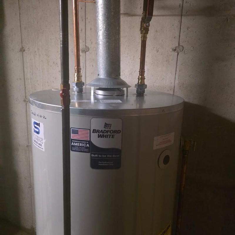 Standard vent water heater with copper piping installation