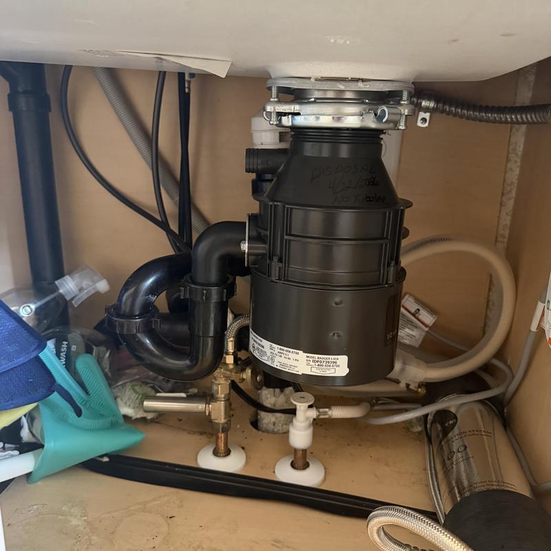 Garbage disposal under-sink plumbing installation