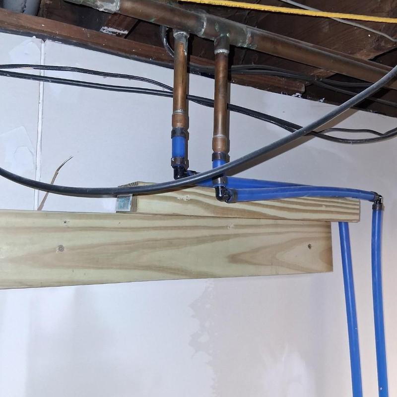 PEX water line connections with copper pipe and bracket