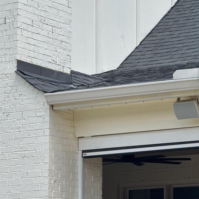 Roof shingles with hail damage and granule loss