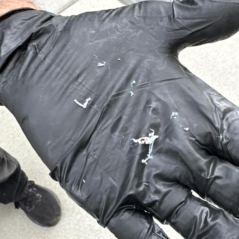 Rinnai tankless water heater flush residue on glove