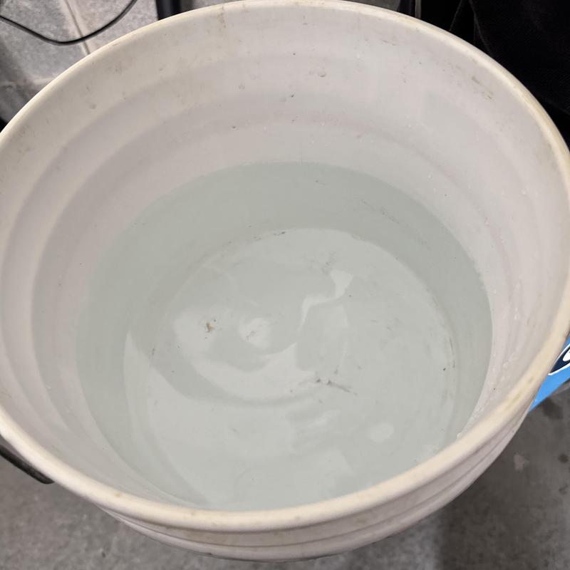 Rinnai tankless water heater flush bucket with water