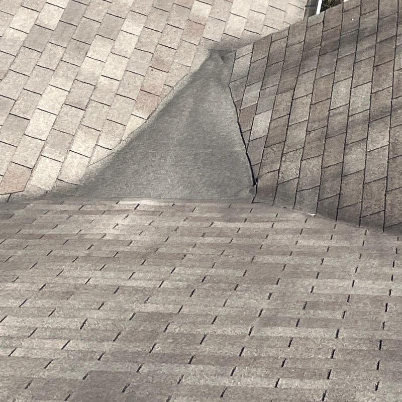 Roof shingles with hail damage and wear patterns
