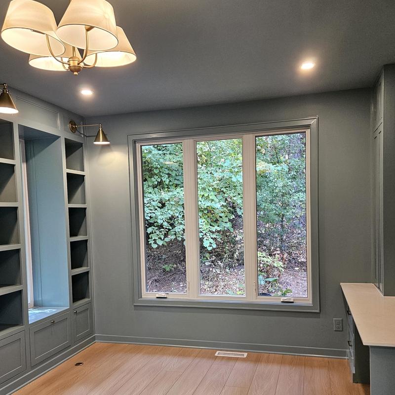 Closet shelving and window with forest view Closet shelving and window with forest view
