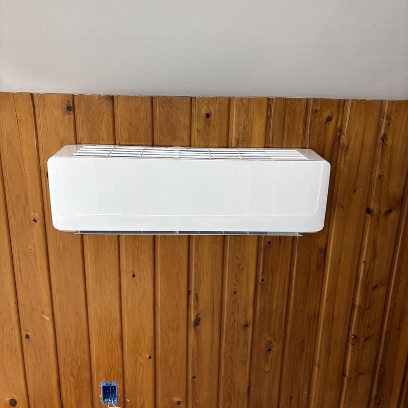 Friedrich Premier 24K indoor air handler on wood wall Friedrich Premier 24K indoor air handler on wood wall