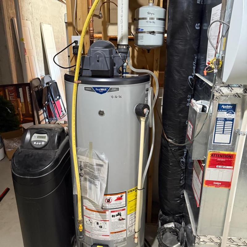 Water heater with expansion tank in basement