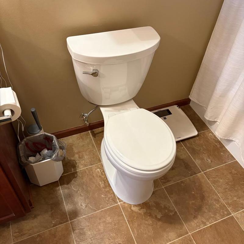 Toilet and shutoff valve installation in bathroom