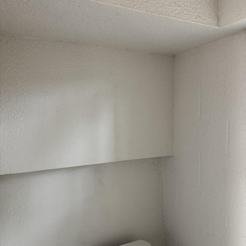 Upstairs kitchen plumbing wall and ceiling area