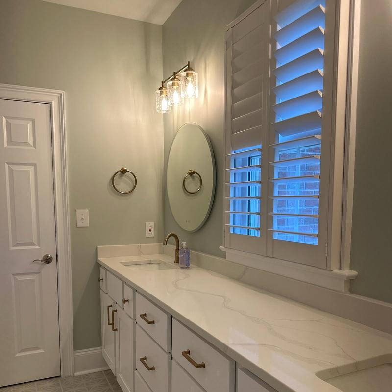 Bathroom vanity countertop with faucet and lighting Bathroom vanity countertop with faucet and lighting