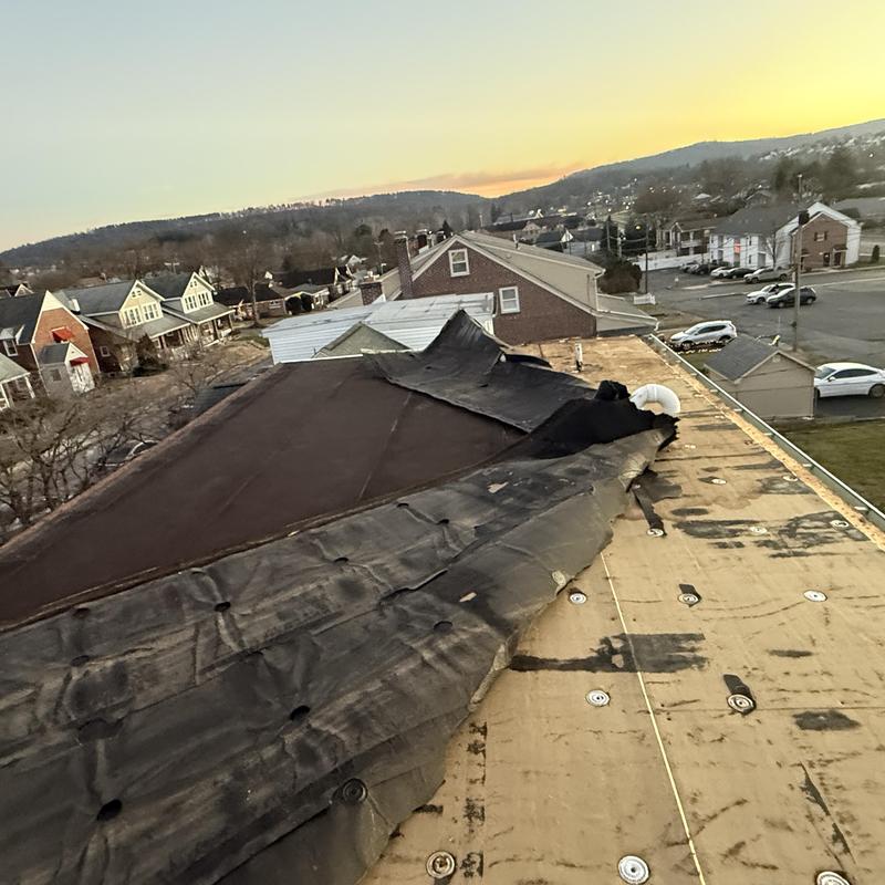 EPDM membrane tear off and roof insulation install