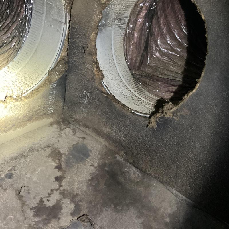 HVAC duct openings with dust and debris buildup