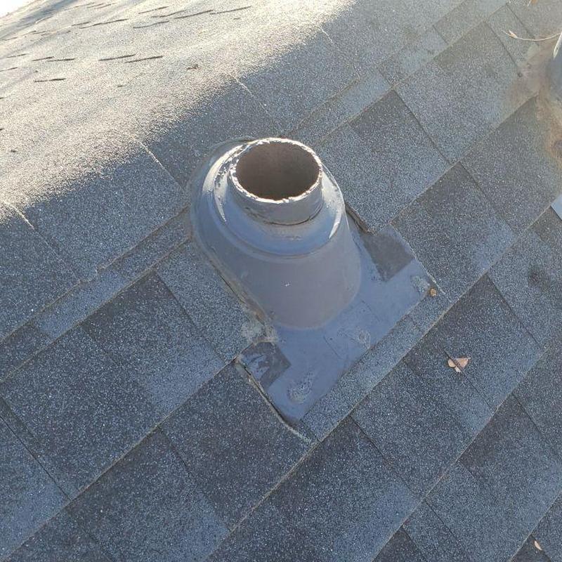Roof pipe jack with sealant on shingle roof