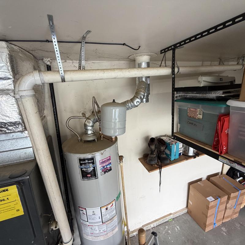 Water heater with failed thermal expansion tank in crawlspace