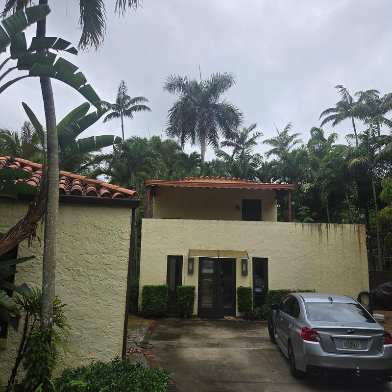 Spanish clay tile roof on residential building in Miami, FL