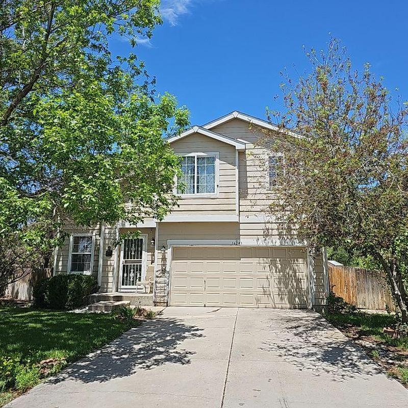 Shingle roof hail damage inspection on two-story house