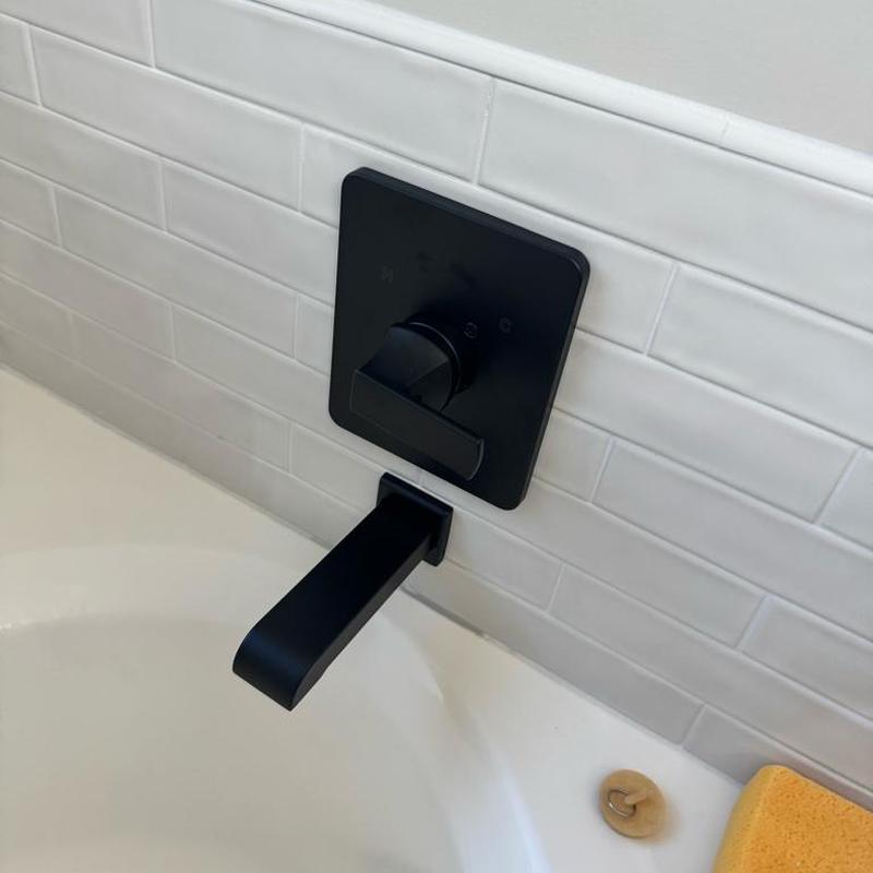 Black bathroom tub faucet and control valve installation