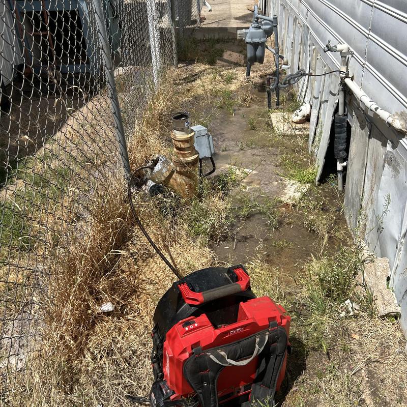 Main sewer drain snaking clearing roots and water backup