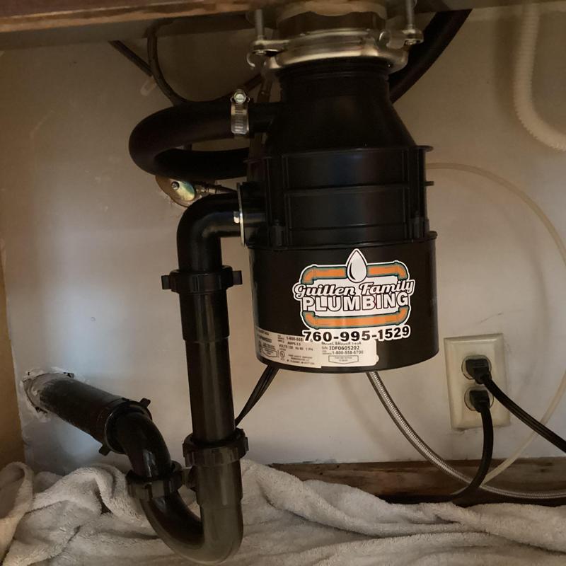 Garbage disposal and drain installation under sink