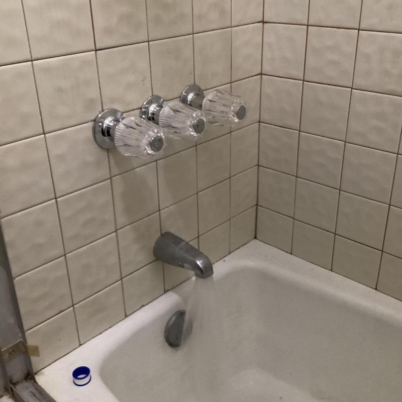 Three-handle shower valve with chrome trim and spout