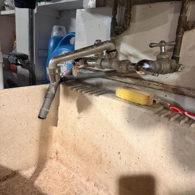 Laundry sink wall-mounted faucet and handles repair