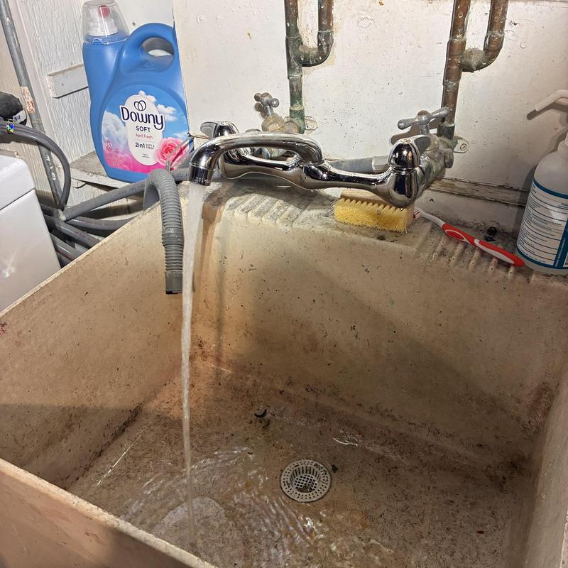 Laundry sink wall-mounted faucet with running water