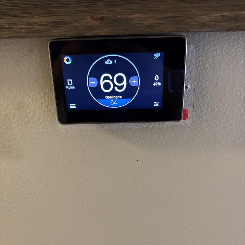 Ruud EcoNet Wi-Fi thermostat installed on wall Ruud EcoNet Wi-Fi thermostat installed on wall