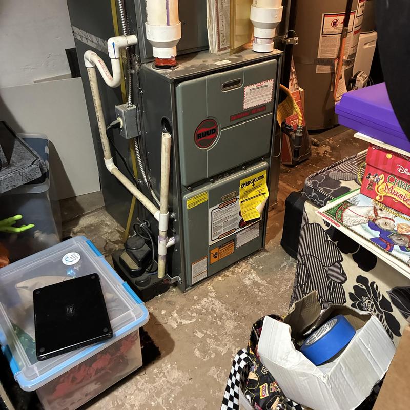Gas furnace system with vent pipes in basement Gas furnace system with vent pipes in basement