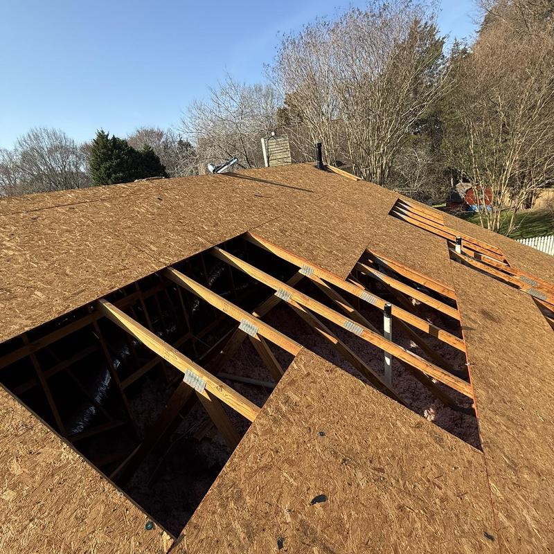 Roof decking with cutouts for skylight installation