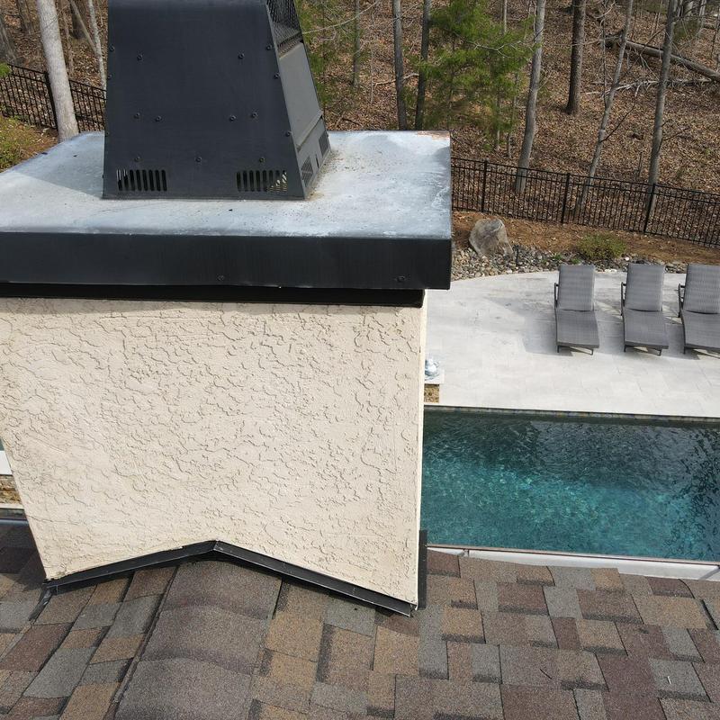 Chimney flashing and shingle roof repair near pool