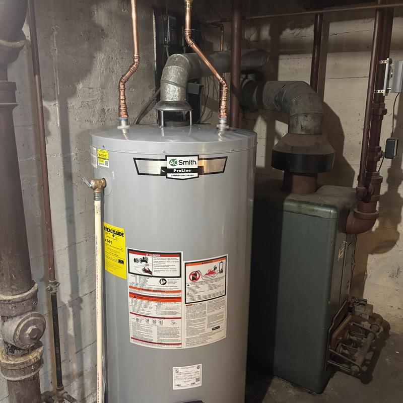 Water heater installation with copper vent pipes