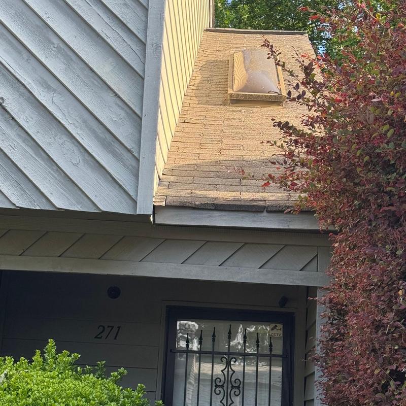 Asphalt shingle roof and vent inspection near entrance